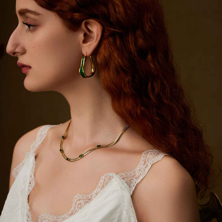   beautiful woman wearing Elf's Rhapsody irregular circle earrings-Copper+18k Yellow Gold-Shesamore jewelry  