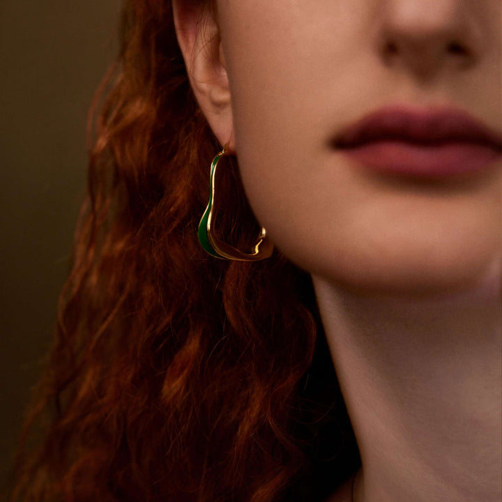   beautiful woman wearing Elf's Rhapsody irregular circle earrings-Copper+18k Yellow Gold-Shesamore jewelry  