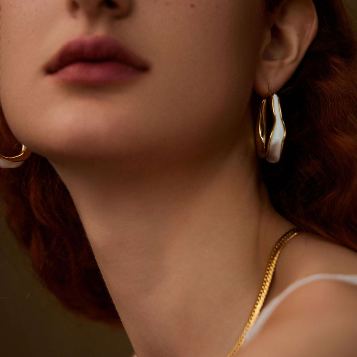 beautiful woman wearing Elf's Wings irregular circle earrings-Copper+18k Yellow Gold Vermeil -Shesamore jewelry