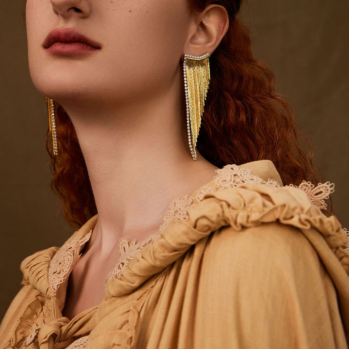 beautiful woman wearing Flames golden tassel diamond earrings-Gold Vermeil-Yellow Gold Vermeil+Cubic Zirconi-Shesamore jewelry 