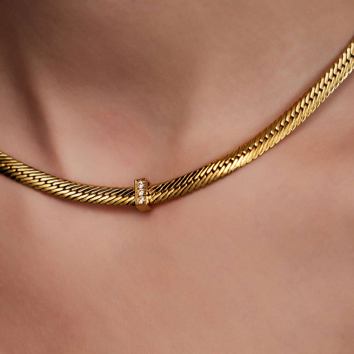 beautiful woman wearing Mystical Guardian gemstone herringbone chain-Gold Vermeil-Copper+18k Yellow Gold Vermeil+Cubic Zirconia-Shesamore jewelry   