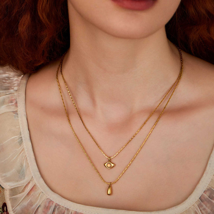  besutiful woman wearing The Divine Eye gold layered necklace-Gold Vermeil-Shesamore jewelry   