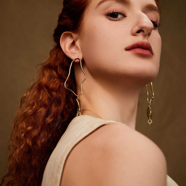  besutiful woman wearing Twelfth Night Melody baroque irregular pearl earrings-Copper-earrings-Gemstones-gold earrings-Gold Vermeil-Shesamore-jewelry  